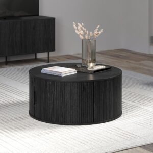 Table basse ronde noire Ronin dans un salon contemporain