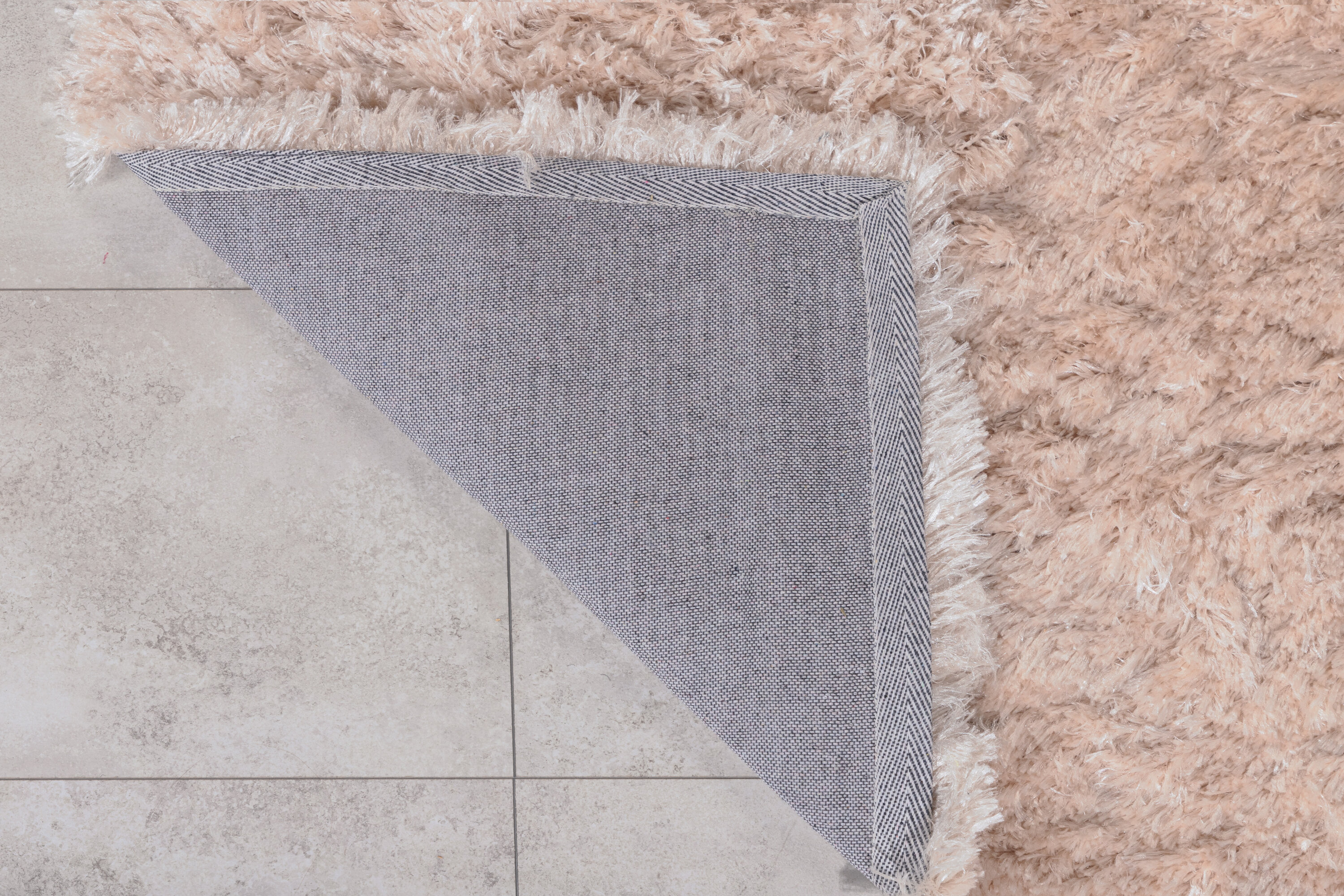 Détail du tapis de salon Natta beige 230 x 160 cm