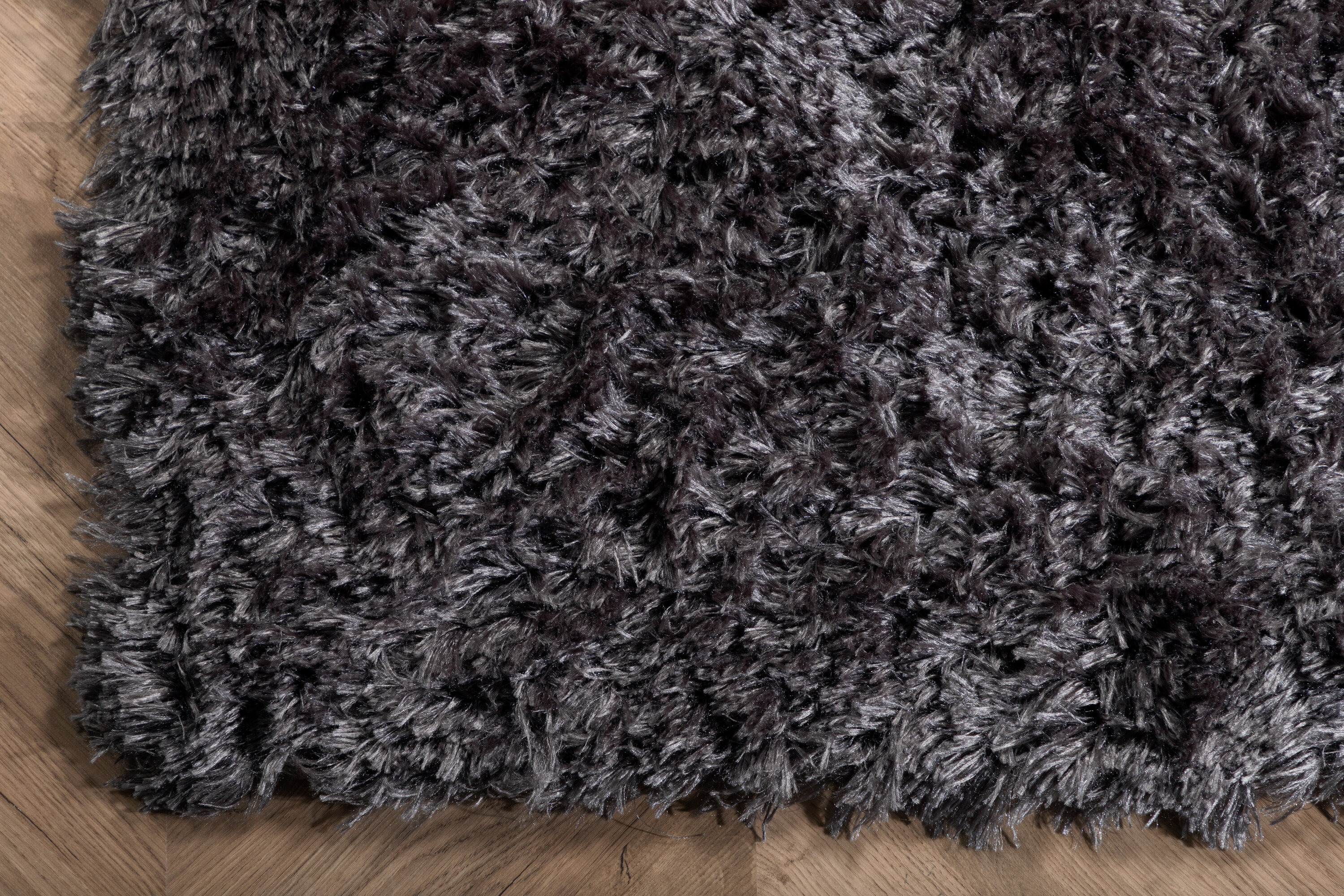 Détail du tapis de salon Natta gris foncé 290 x 200 cm