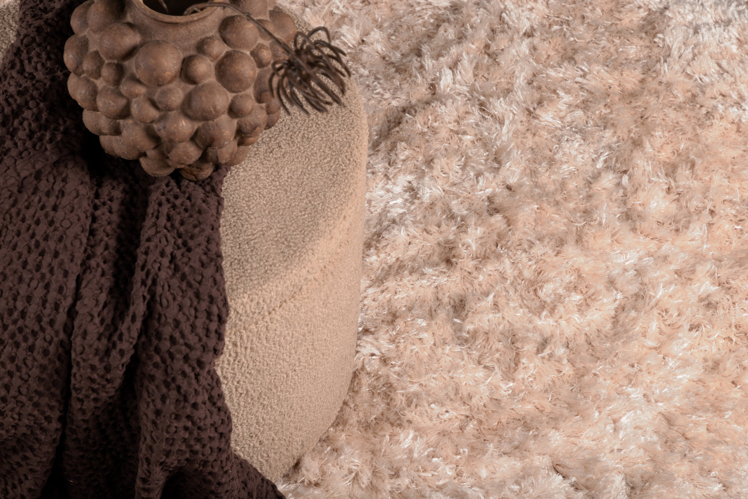 Détail du tapis de salon Natta beige ⌀200 cm