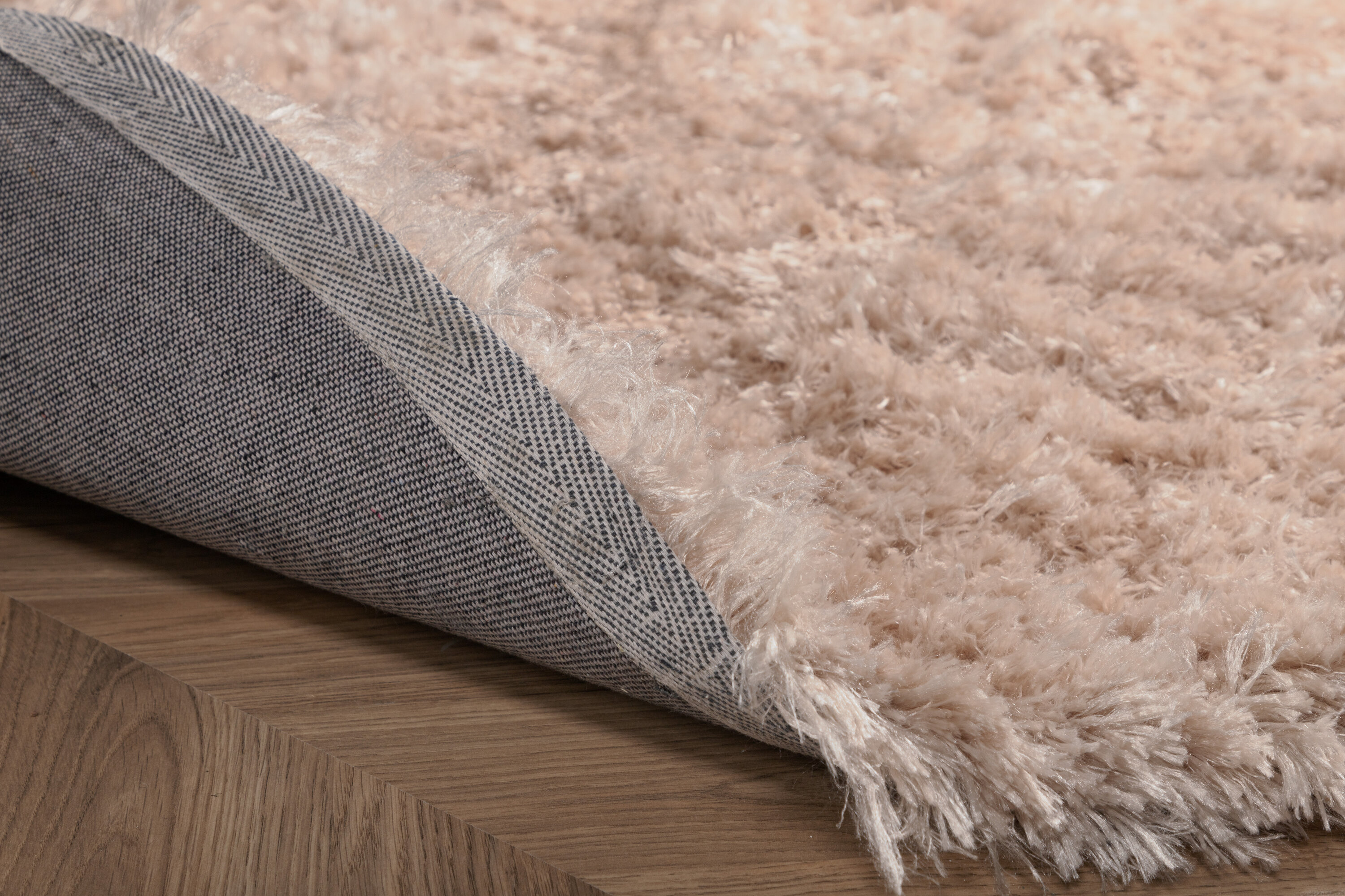 Détail du tapis de salon Natta beige ⌀200 cm