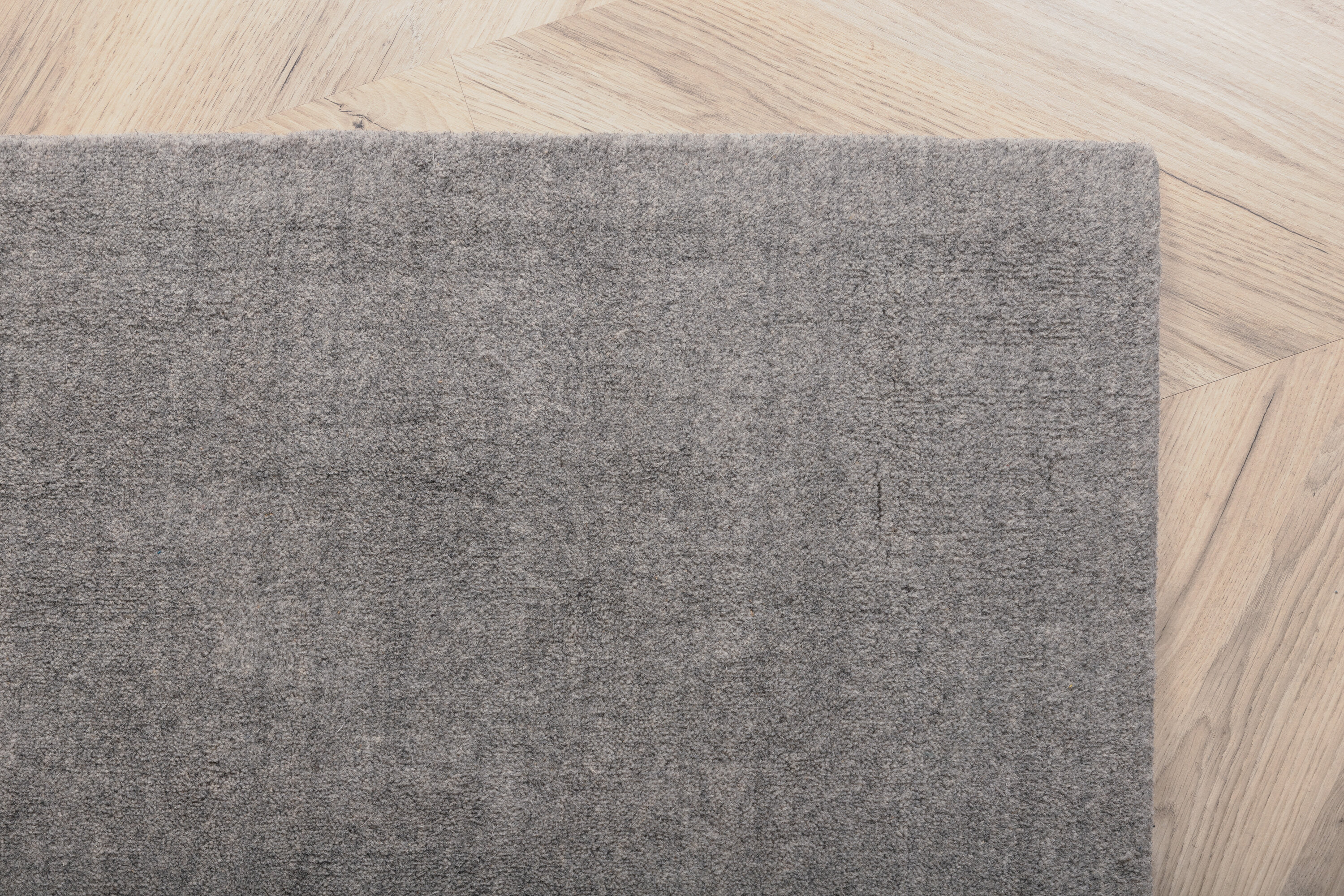 Détail du tapis de salon Ulla gris clair 350 x 250 cm