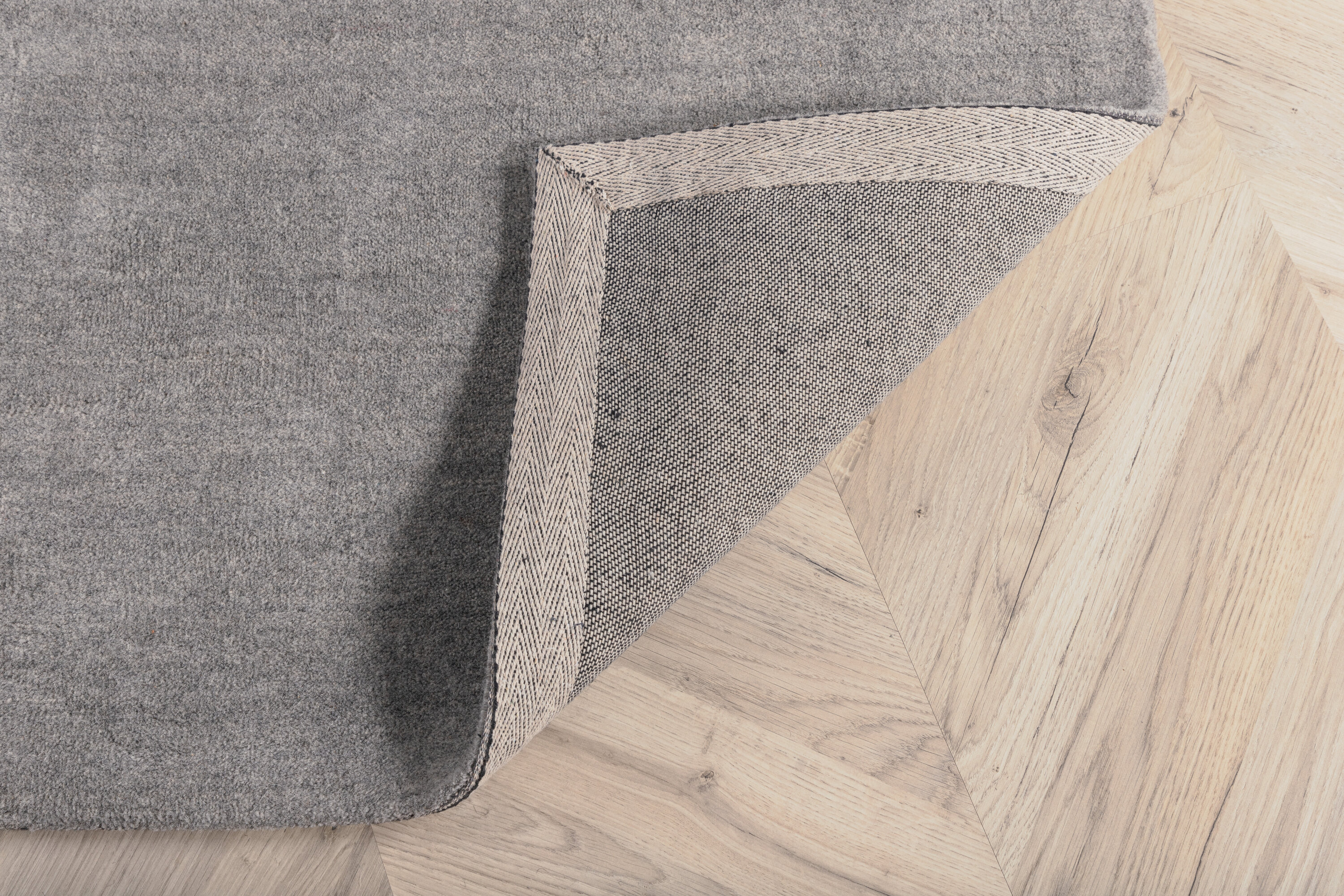 Détail du tapis de salon Ulla gris clair 350 x 250 cm