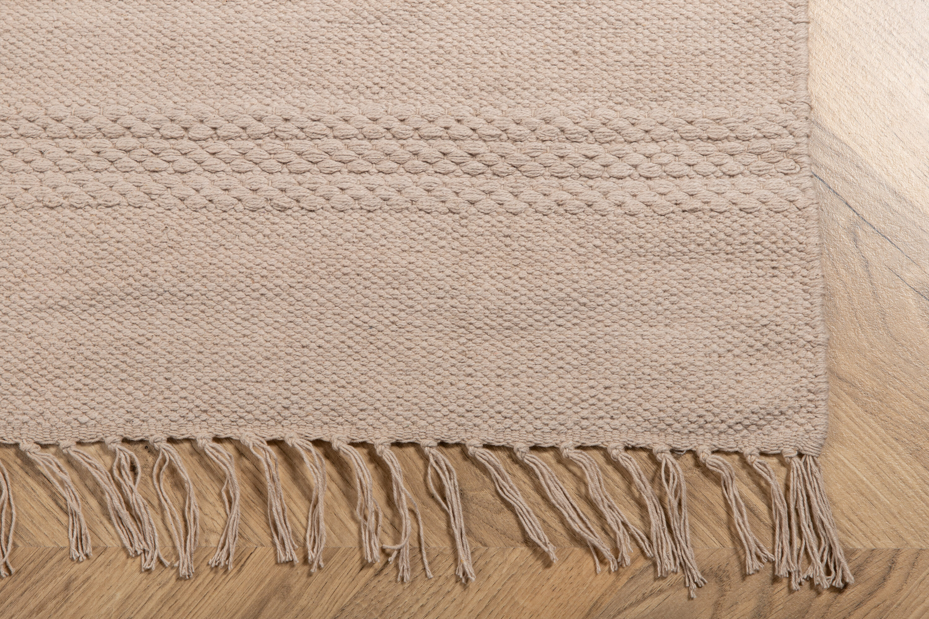 Détail du tapis de salon Nico beige 230 x 160 cm