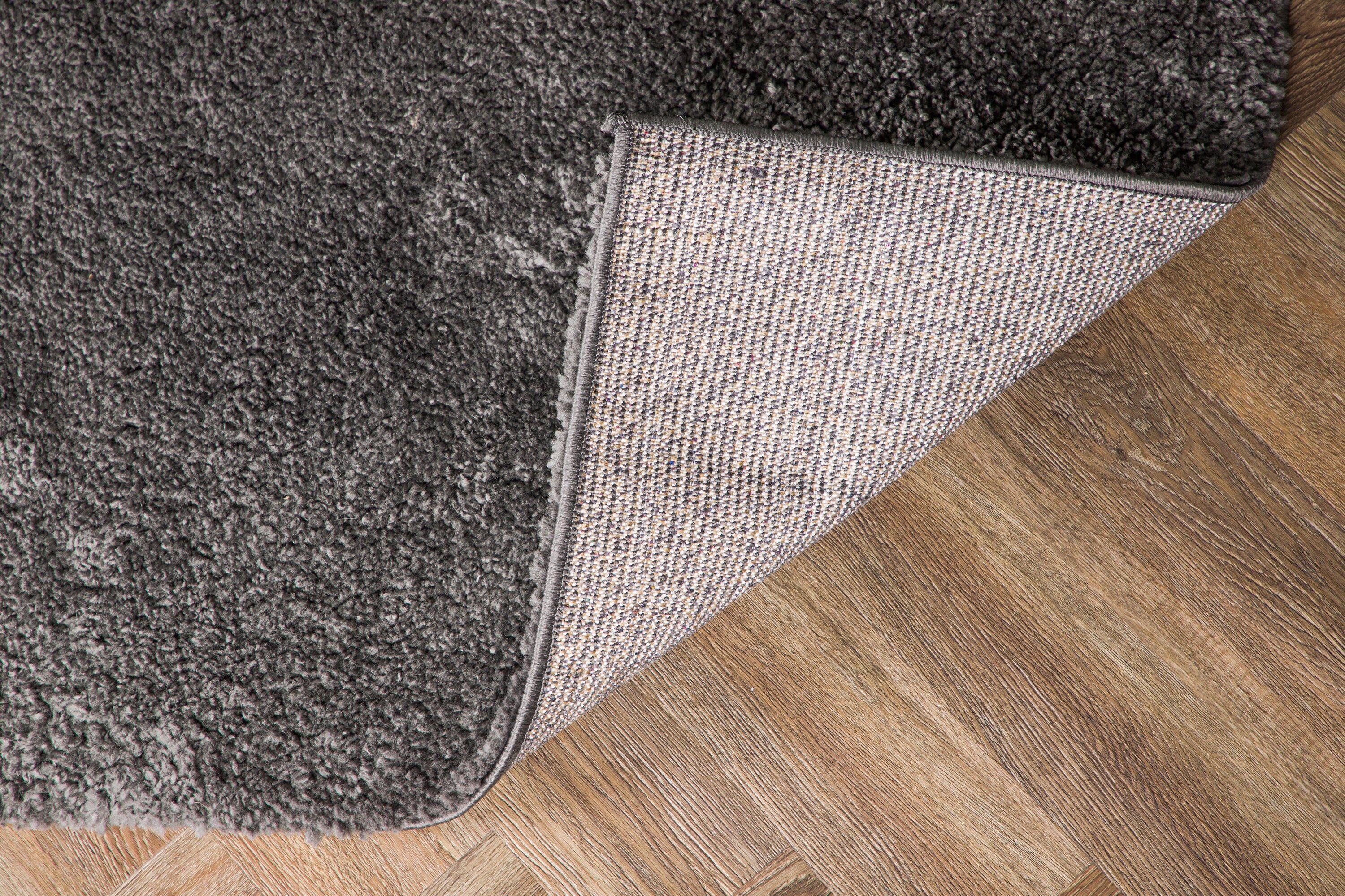 Walter tapis de salon gris foncé 230 x 160 cm en situation dans une pièce décorée