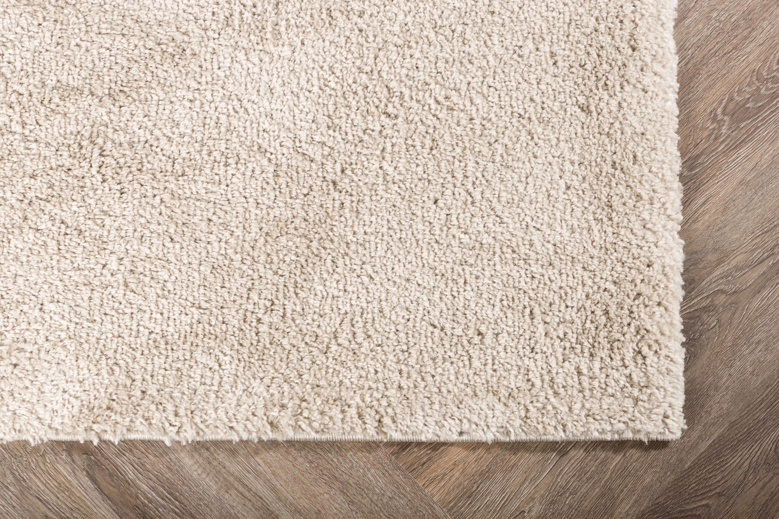 Walter tapis de salon beige 340 x 240 cm en situation dans une pièce décorée