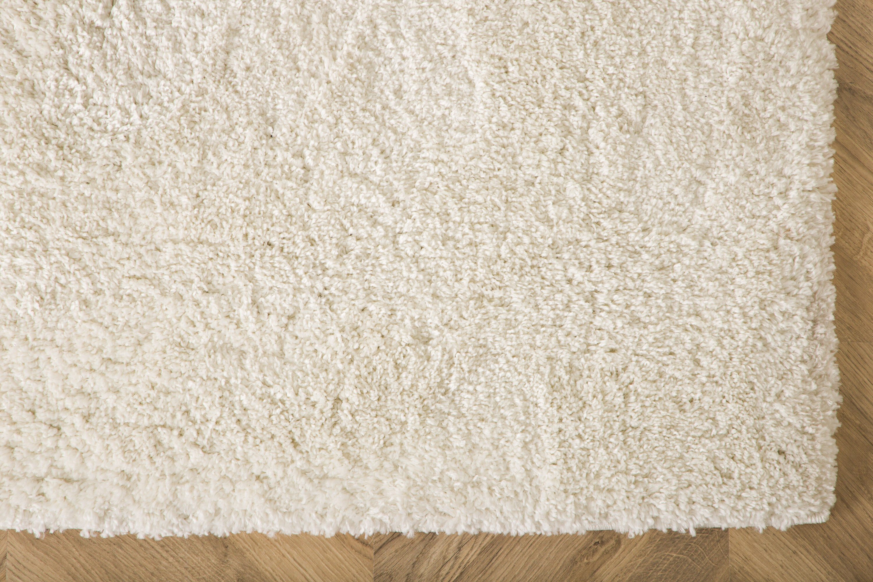 Walter tapis de salon blanc 290 x 200 cm en situation dans une pièce décorée