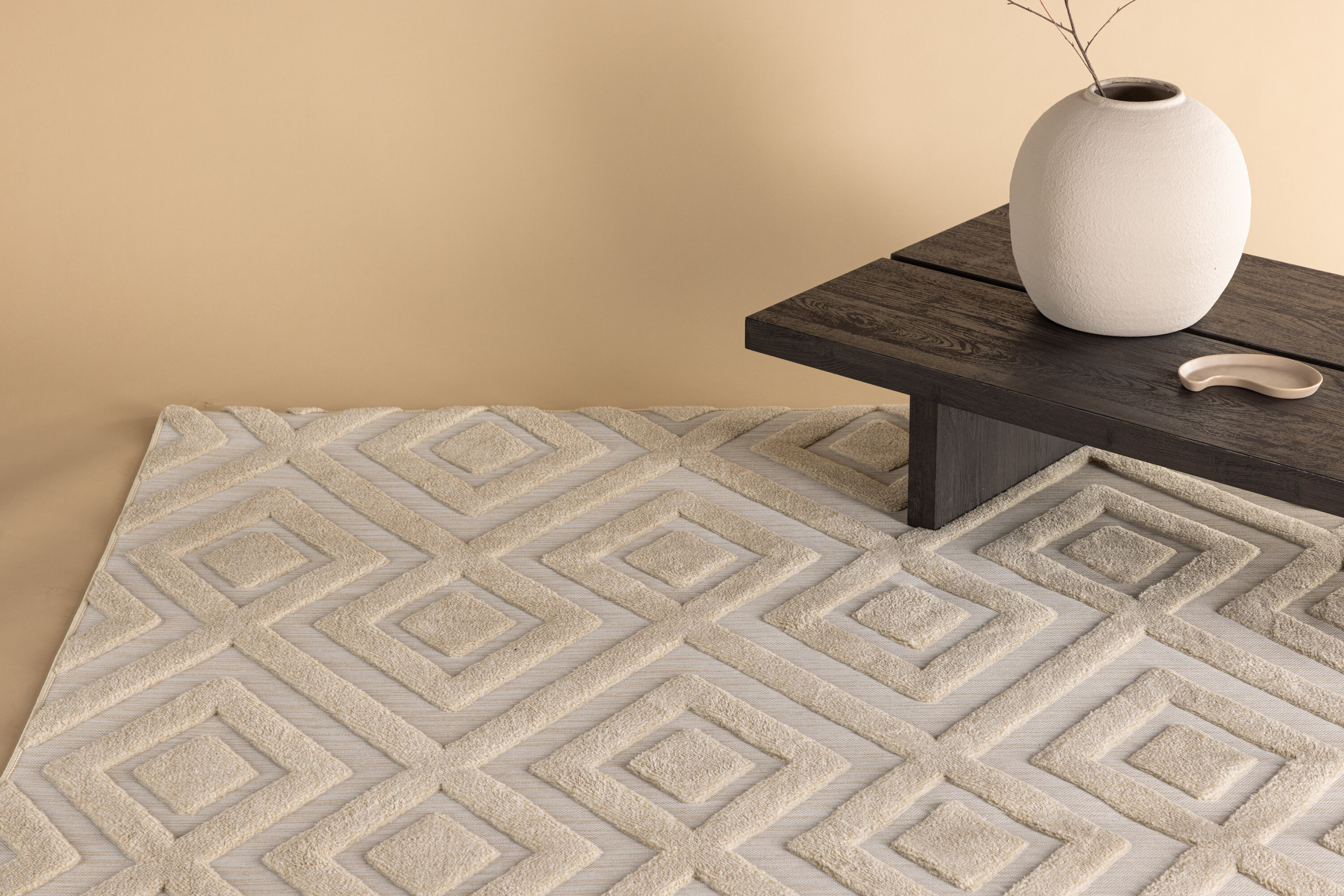 Pia tapis de salon beige 230 x 160 cm en situation dans une pièce décorée