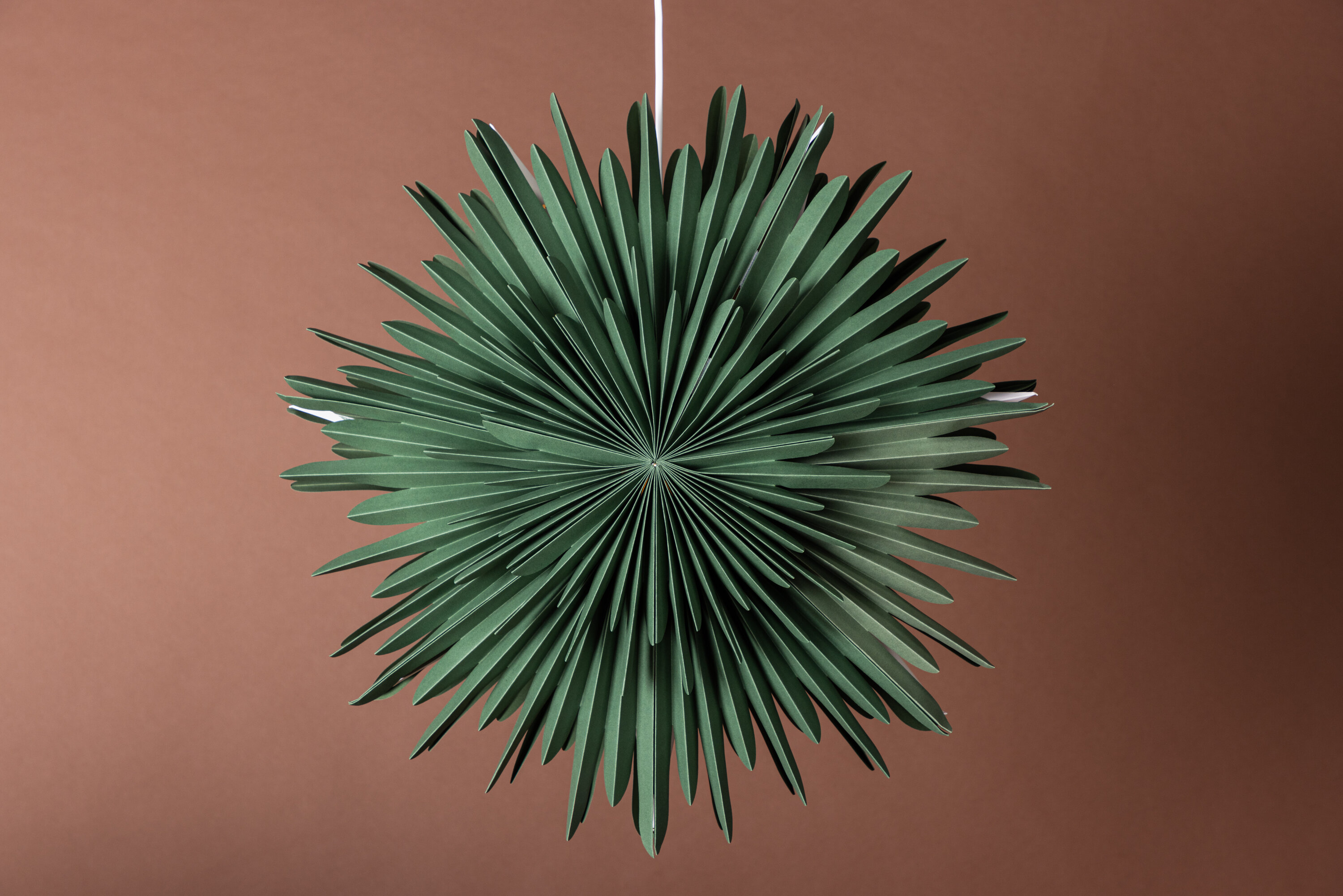 Sälen éclairage de noël vert, blanc ⌀60 cm en situation dans une pièce décorée